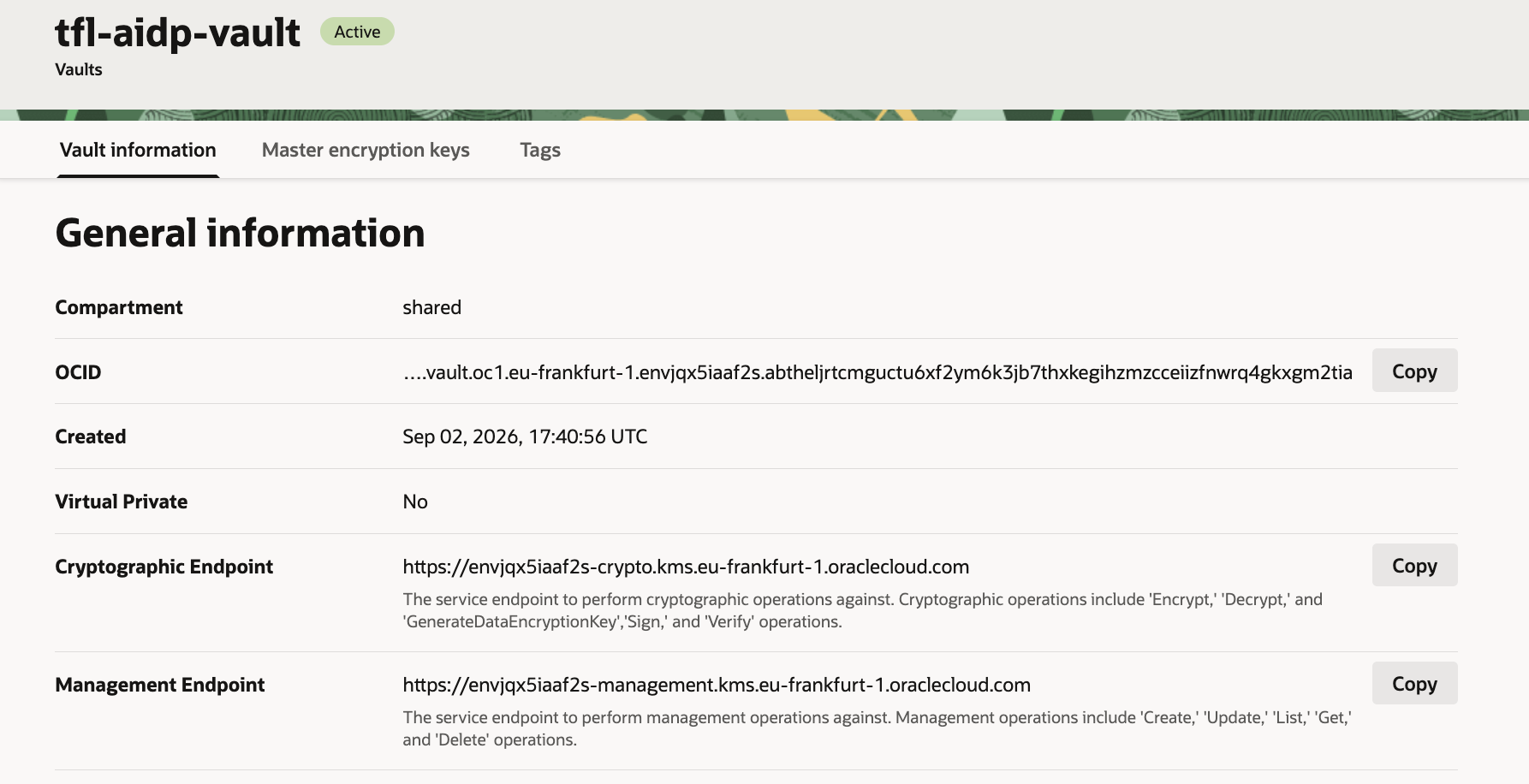 tfl-aidp-vault detail page, Active, compartment shared, with cryptographic and management endpoints