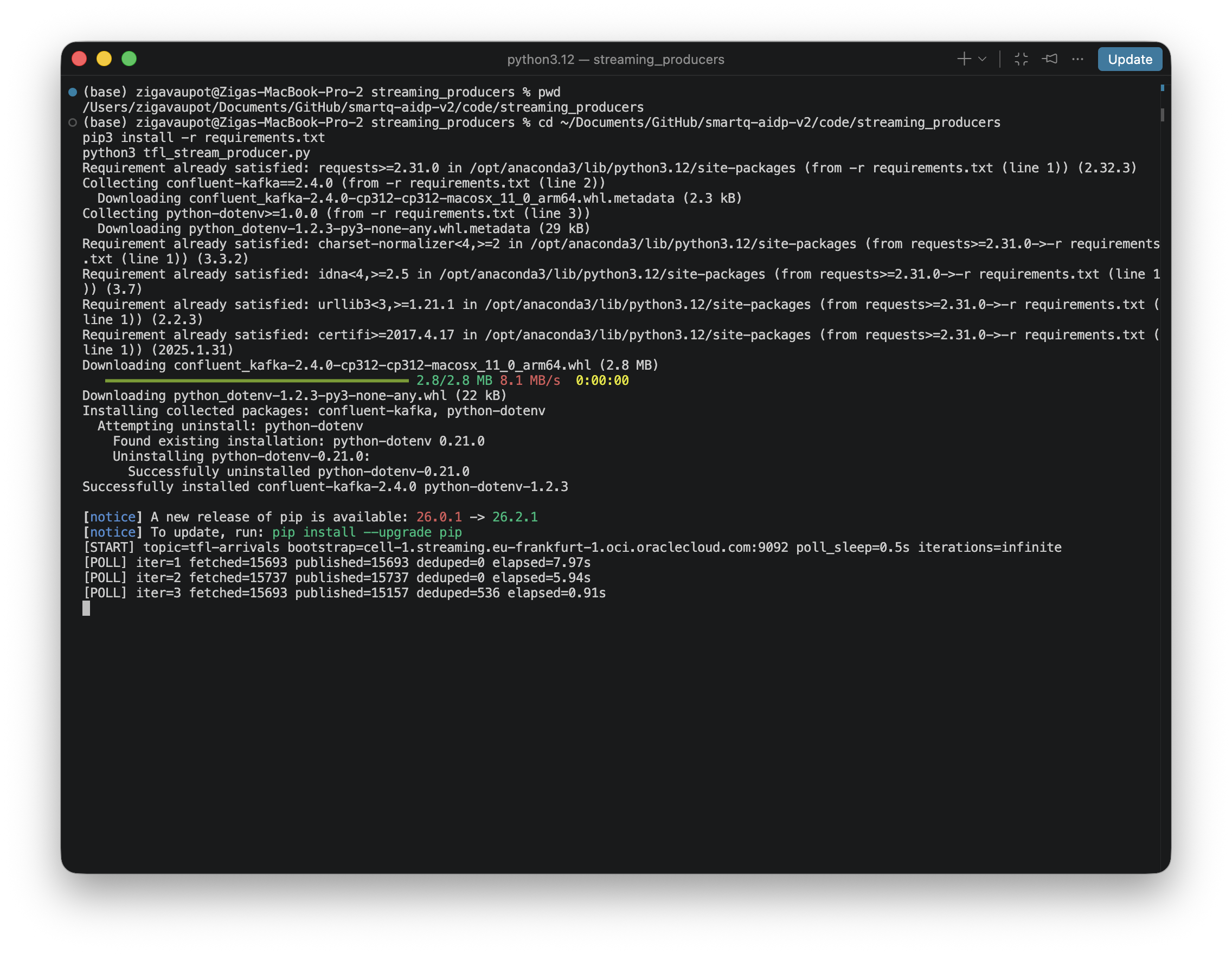 Terminal showing the producer running locally with POLL lines and dedupe stats
