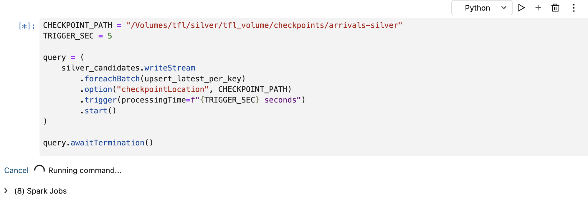 The silver write-stream cell running, blocked on awaitTermination